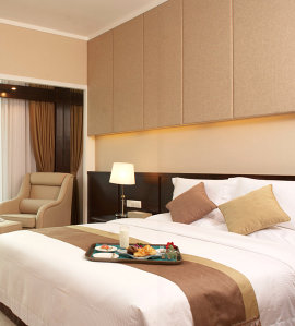 white bed with foods in the bed