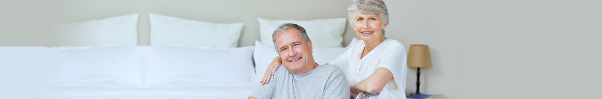 elderly couple smiling